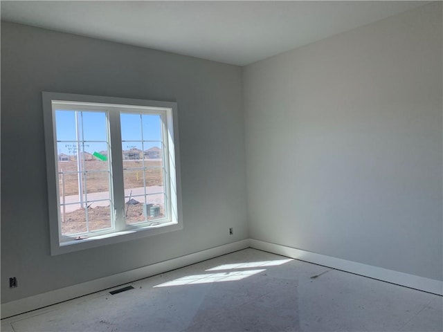 spare room featuring visible vents