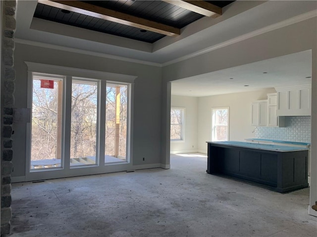 unfurnished room featuring beam ceiling, wood ceiling, baseboards, and ornamental molding