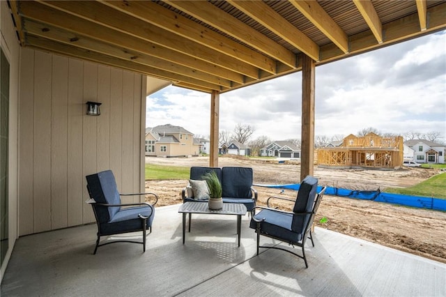 view of patio with a residential view