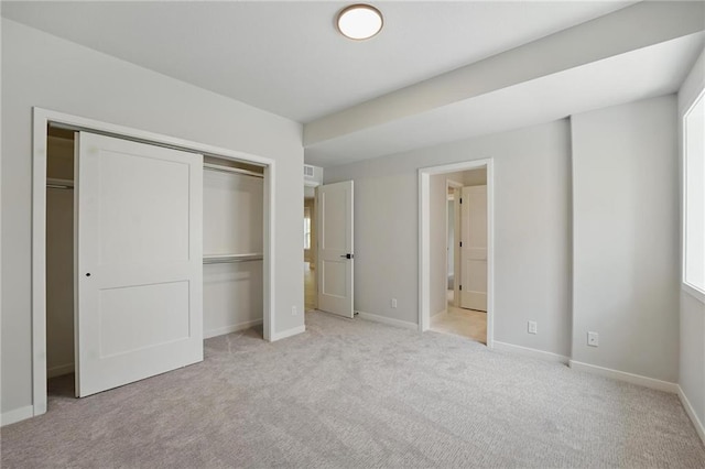 1406 NW 106th Ter, Kansas City, MO 64155 - unfurnished bedroom featuring light carpet and a closet