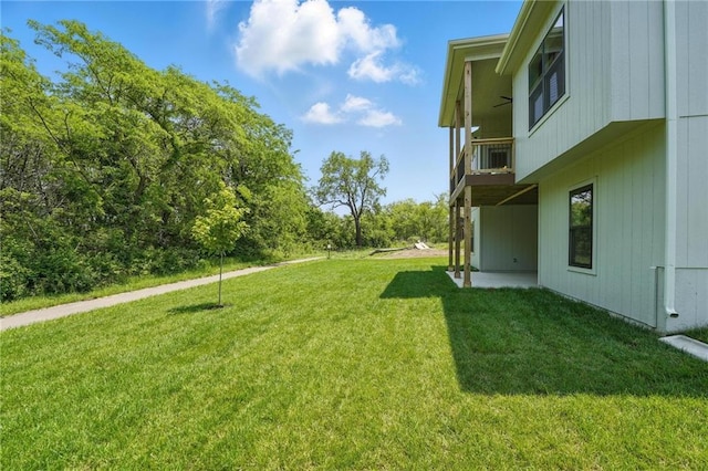 1406 NW 106th Ter, Kansas City, MO 64155 - view of grassy yard with a balcony