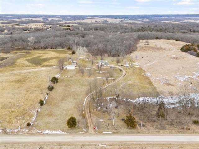 birds eye view of property featuring a rural view