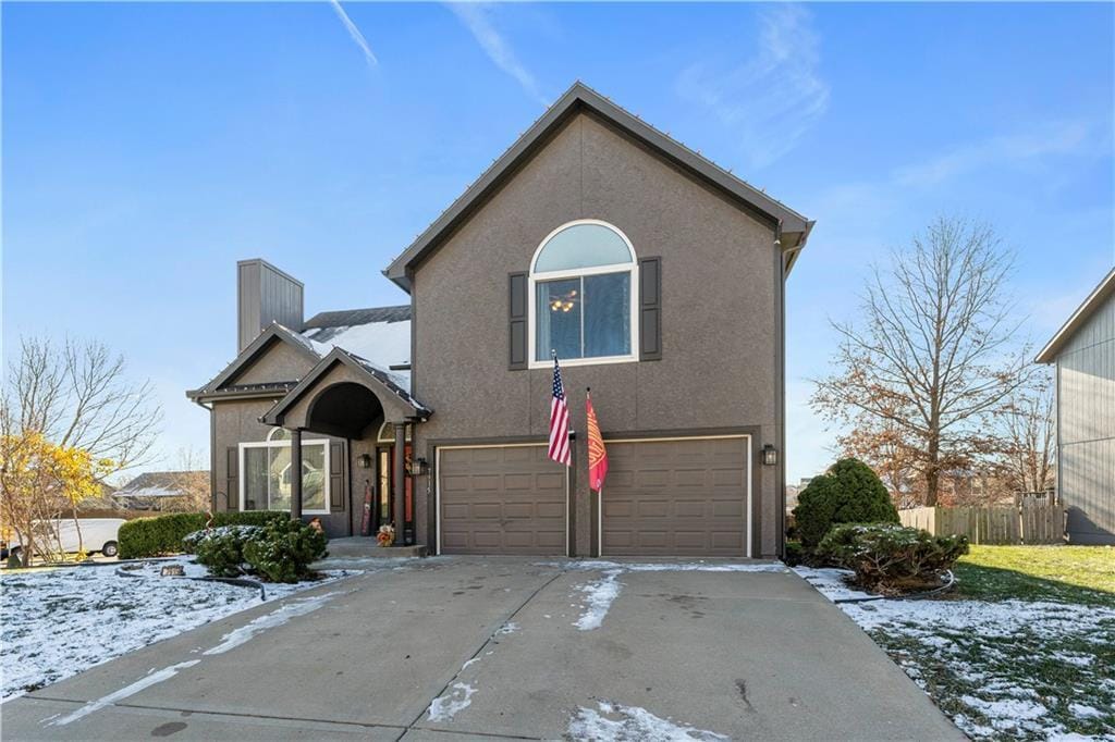 front of property featuring a garage