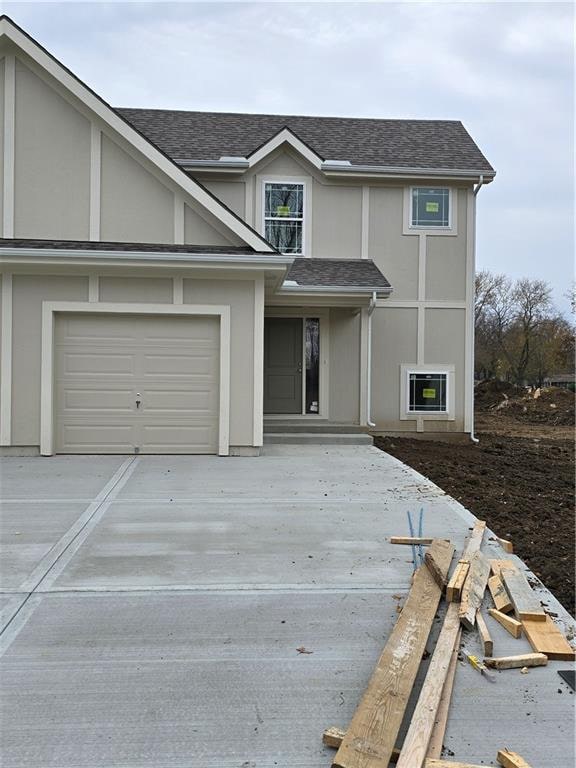 view of front of home with a garage