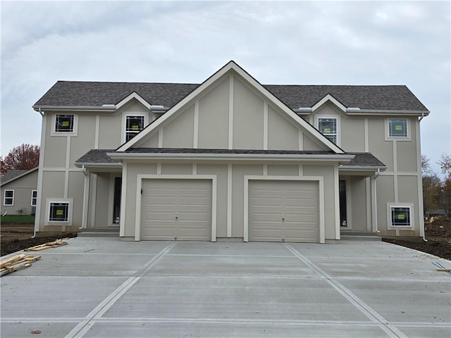 tudor home with a garage