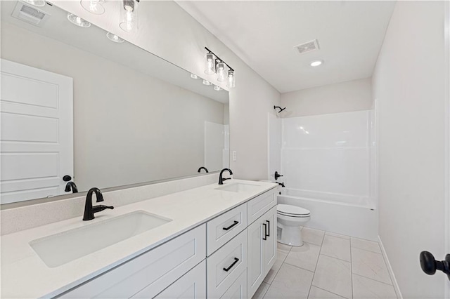 full bathroom with tile patterned flooring, vanity, shower / bathtub combination, and toilet