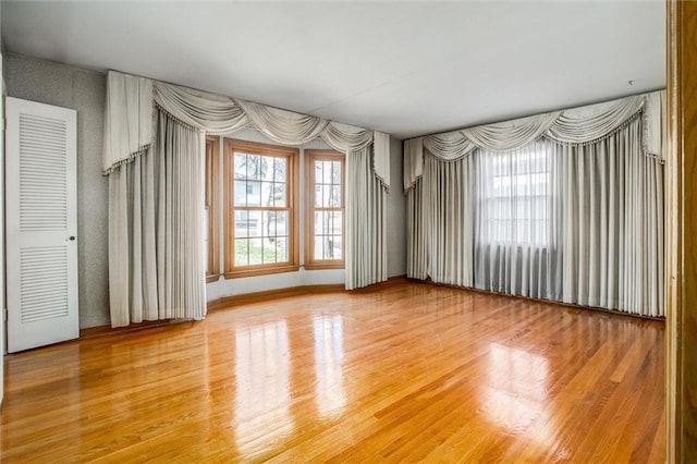 spare room featuring hardwood / wood-style flooring