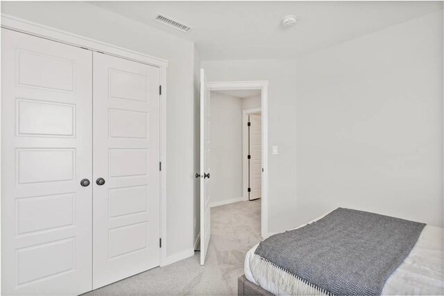 19713 W 195th Pl, Spring Hill, KS 66083 - bedroom with light carpet and a closet