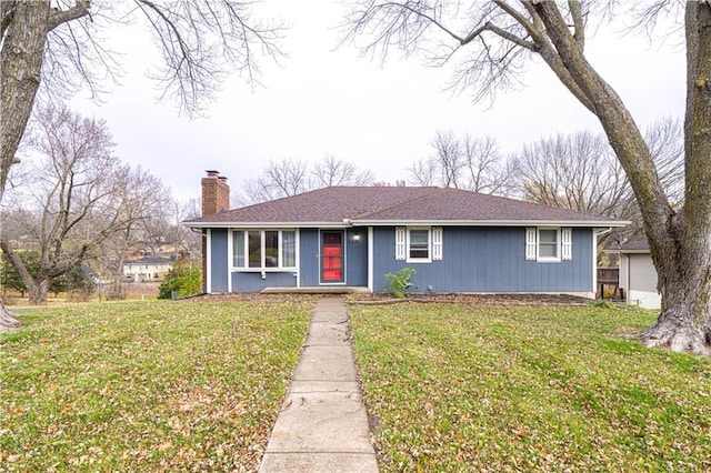 ranch-style house with a front lawn