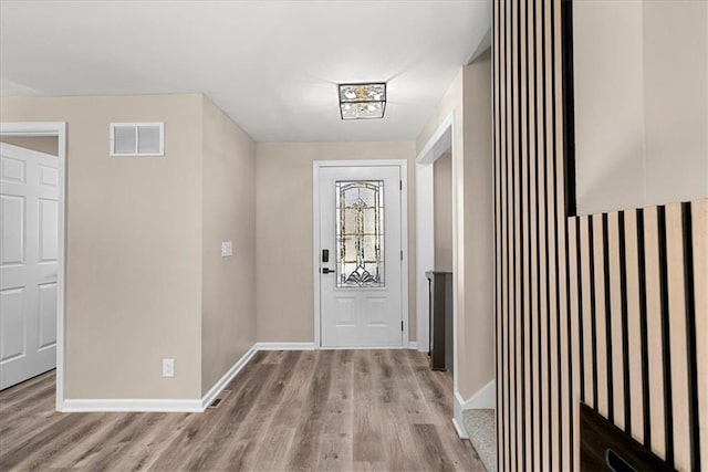 doorway featuring light hardwood / wood-style floors