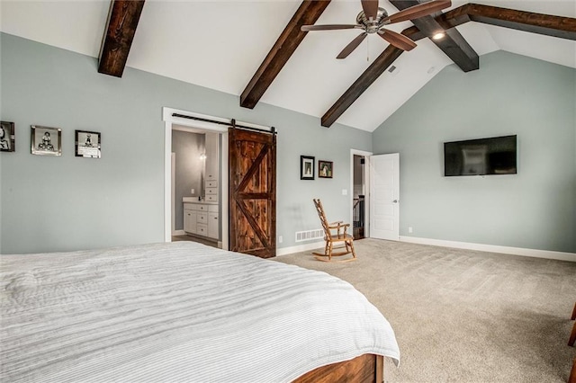 bedroom featuring carpet, ceiling fan, a barn door, high vaulted ceiling, and connected bathroom