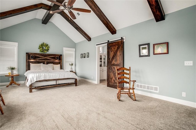 carpeted bedroom with high vaulted ceiling, ceiling fan, a barn door, connected bathroom, and beam ceiling