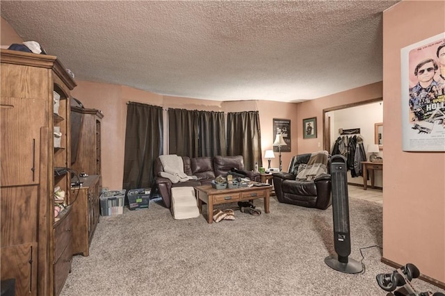 living room featuring light colored carpet and a textured ceiling