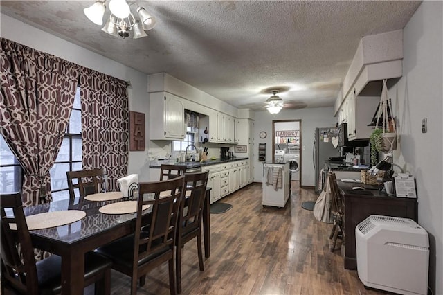 dining room with a textured ceiling, dark hardwood / wood-style flooring, washer / clothes dryer, and ceiling fan