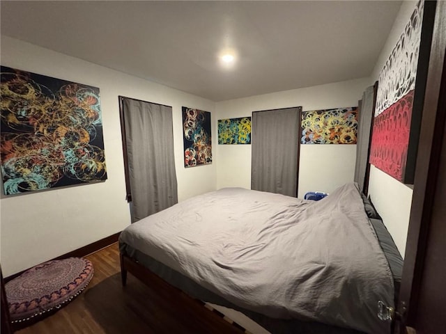 bedroom featuring hardwood / wood-style floors