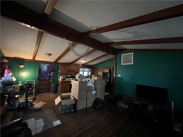 living room with lofted ceiling with beams, dark wood finished floors, and visible vents