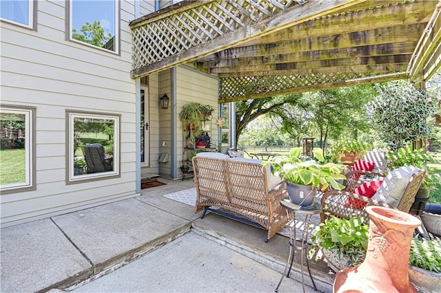 view of patio with a pergola and an outdoor hangout area