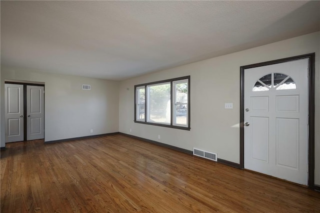 entryway featuring hardwood / wood-style flooring