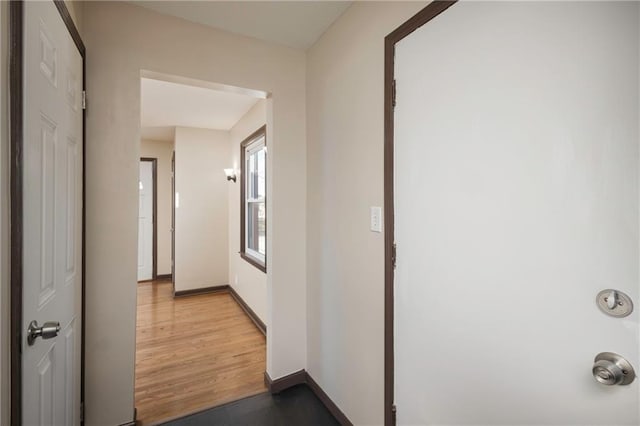 corridor featuring light wood-type flooring