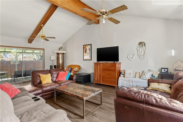 living room featuring hardwood / wood-style flooring, lofted ceiling with beams, and ceiling fan