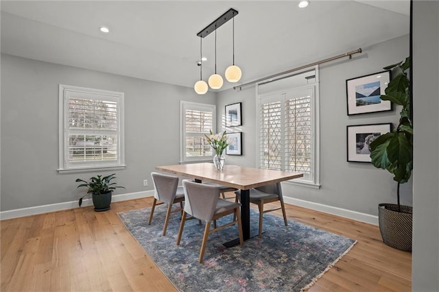 dining area featuring a healthy amount of sunlight and light wood-type flooring