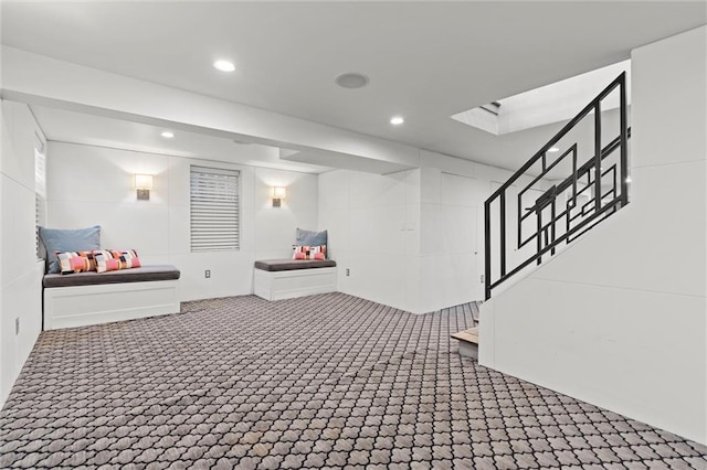 basement featuring carpet