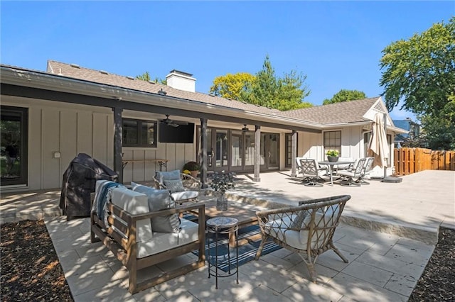 view of patio / terrace featuring ceiling fan, a grill, and an outdoor hangout area