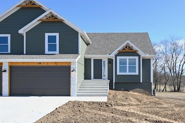 view of front of property with a garage