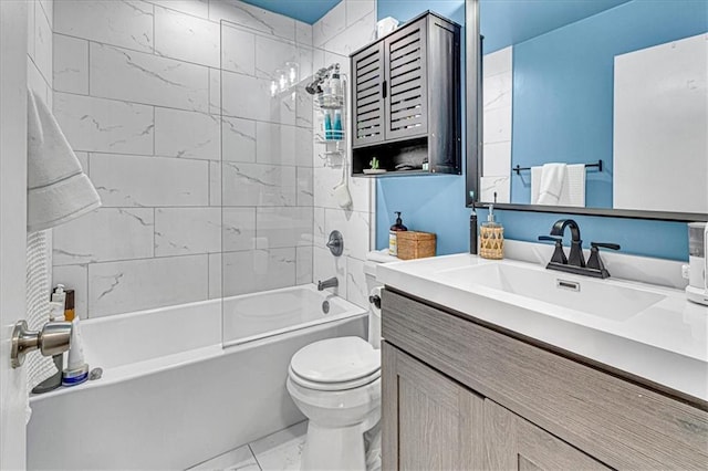 full bathroom with tiled shower / bath combo, toilet, and vanity