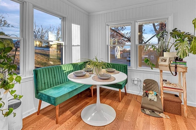 sunroom featuring breakfast area