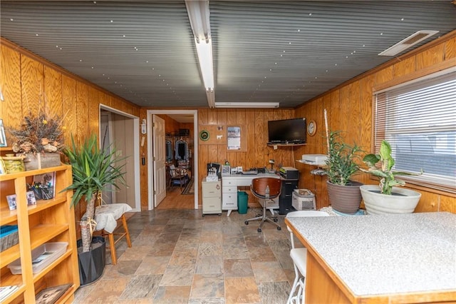 home office with wooden walls