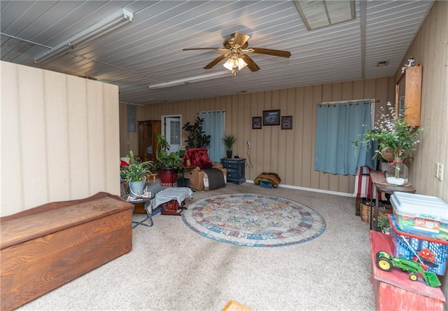 exterior space featuring ceiling fan