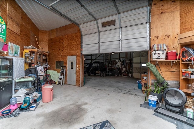 garage with wood walls