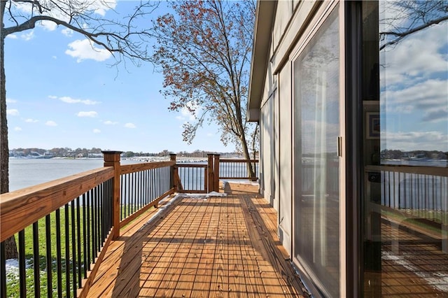 deck featuring a water view