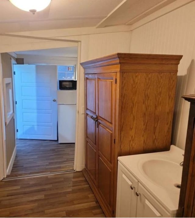 bathroom featuring hardwood / wood-style floors and vanity