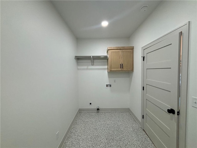 laundry area featuring electric dryer hookup, cabinets, and hookup for a washing machine