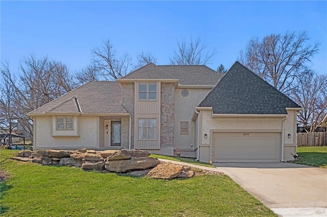 view of front facade featuring a front lawn and a garage