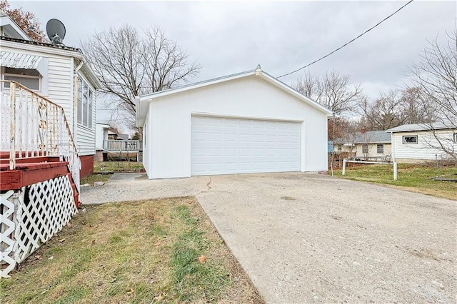 garage featuring a yard