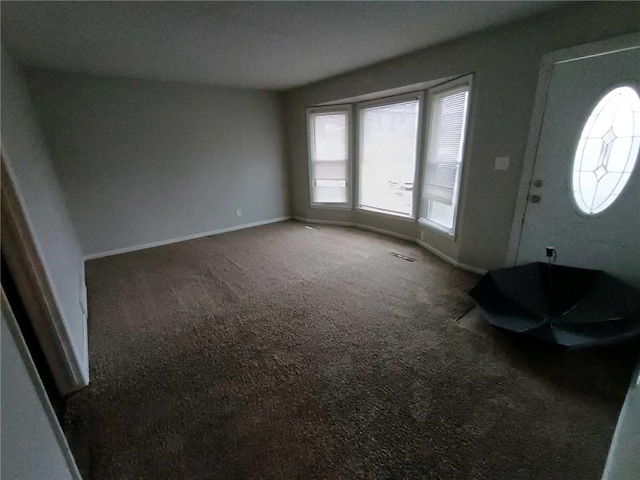 6204 Fairlane Dr, Kansas City, MO 64134 - carpeted foyer with baseboards