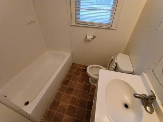 6204 Fairlane Dr, Kansas City, MO 64134 - full bath with toilet and tile patterned flooring