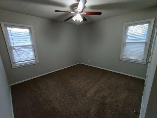 6204 Fairlane Dr, Kansas City, MO 64134 - spare room featuring a ceiling fan and carpet floors