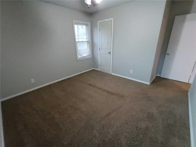6204 Fairlane Dr, Kansas City, MO 64134 - unfurnished bedroom featuring carpet and ceiling fan