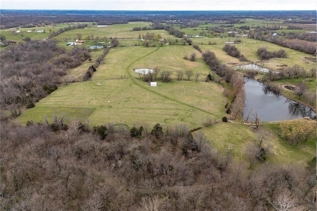 aerial view with a water view and a rural view