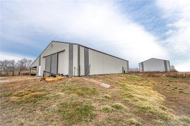 view of outbuilding with a rural view