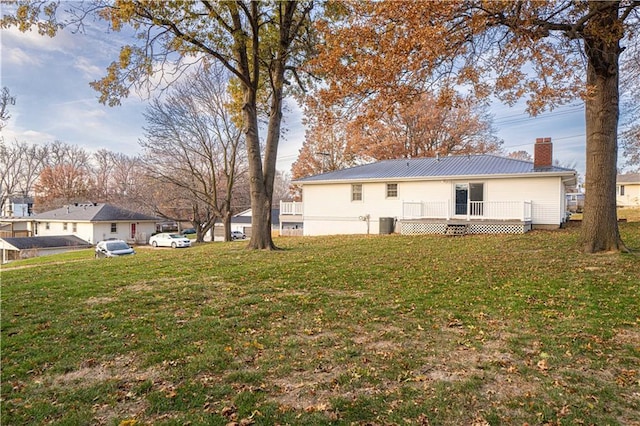 view of yard featuring a wooden deck