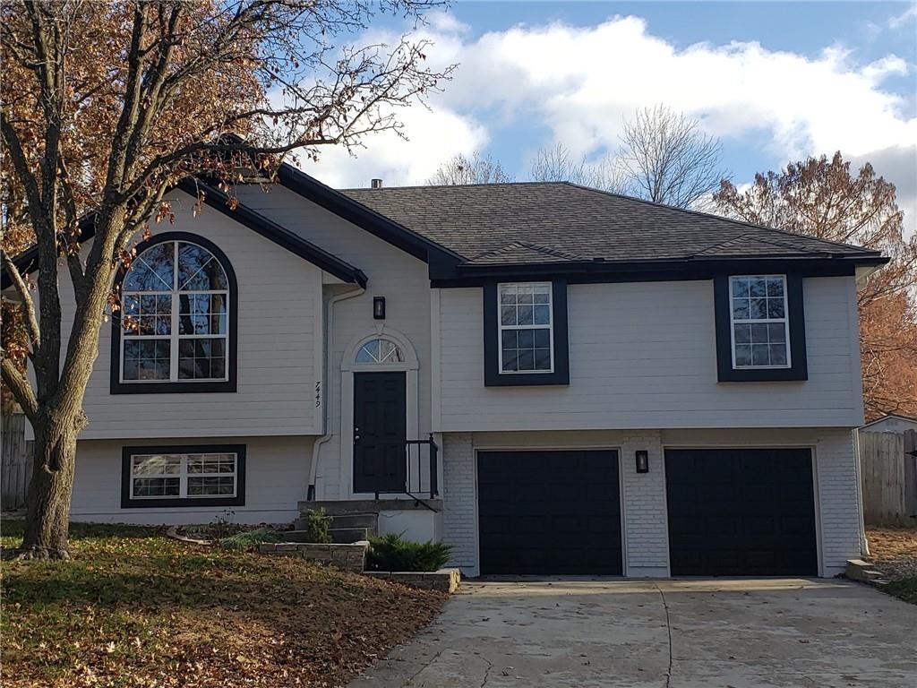 split foyer home featuring a garage