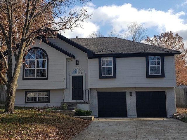 split foyer home featuring a garage