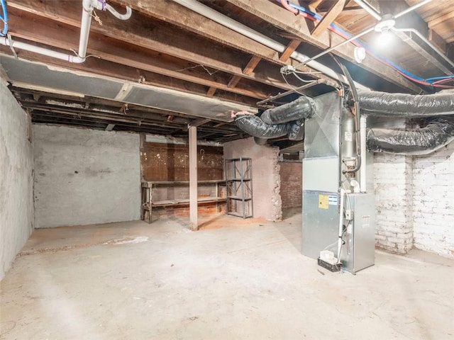 basement featuring heating unit