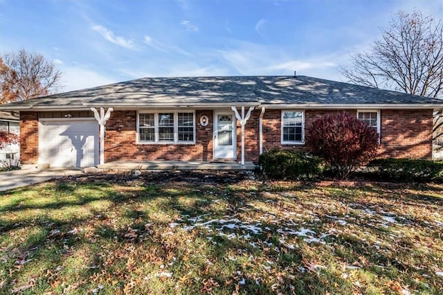 single story home with a garage and a front yard