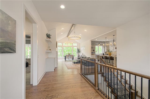 2150 NW Scenic View Dr, Riverside, MO 64150 - corridor featuring a chandelier, light wood-type flooring, and recessed lighting